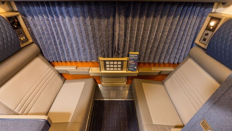 A Roomette set up for day uses, the seats fold down flat to create the lower berth