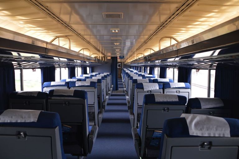 Coach class on the upper level of a Superliner train