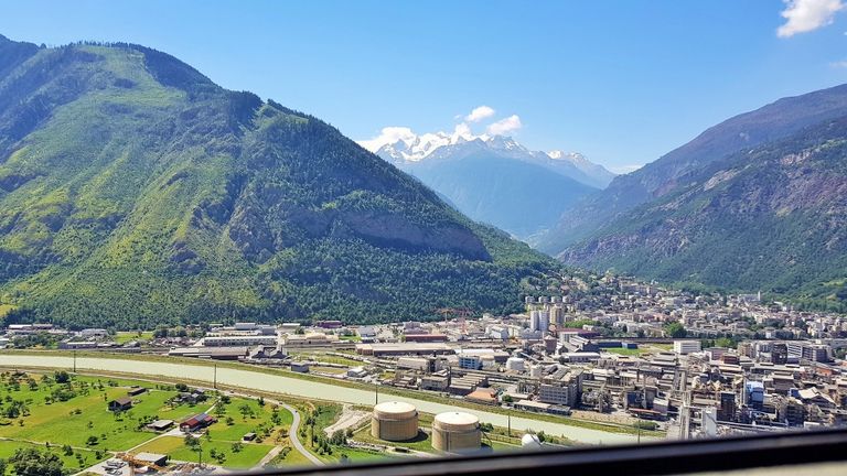 Looking down over the town of Visp from a train travelling between Bern and Domodossola