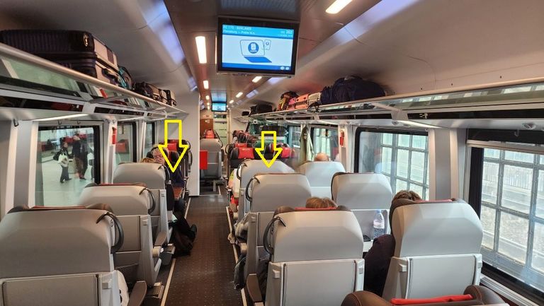 The arrows are showing the locations of one of only two sets of table seats in this carriage on a brand new Czech Comfort Jet train