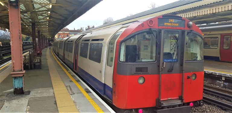 One of the older Piccadilly line trains heads towards central London